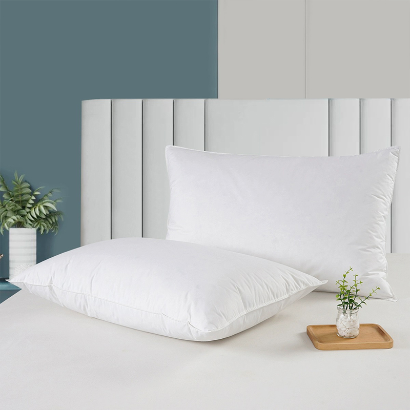 Why are white duck down and feather pillows so soft and breathable?